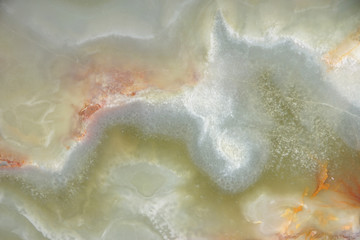 Background from a pattern of a natural stone of green onyx