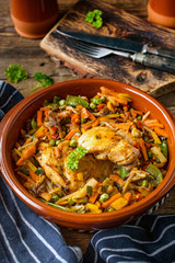 Fried chicken fillet with vegetables.