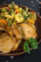 Fried chicken fillet with vegetables.