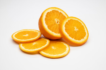 slices of orange on white background