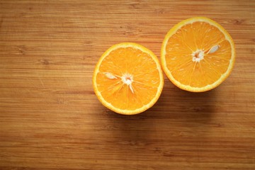 orange on wooden table