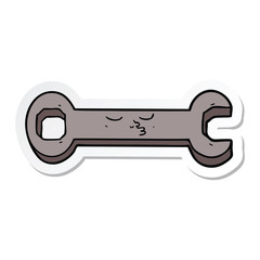 sticker of a cartoon spanner