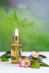 Organic cosmetics, natural oil, handmade with herbal and primrose flower extracts in glass bottles