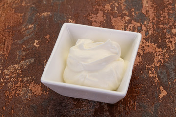 Sour cream in the bowl