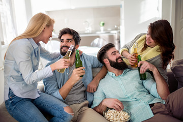 Group of friends together at home