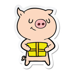 sticker of a happy cartoon pig with christmas present