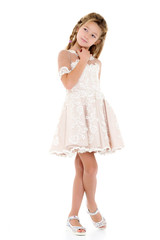 Little girl in an elegant dress.