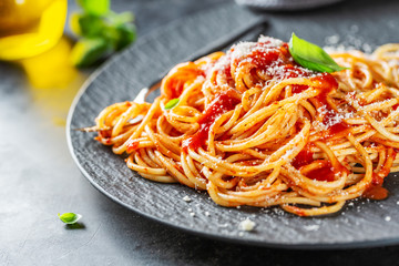 Tasty italian pizza with tomato sauce and parmesan