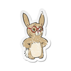 retro distressed sticker of a cartoon rabbit wearing spectacles