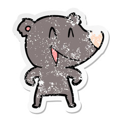 distressed sticker of a laughing bear cartoon