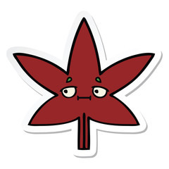 sticker of a cute cartoon autumnal leaf