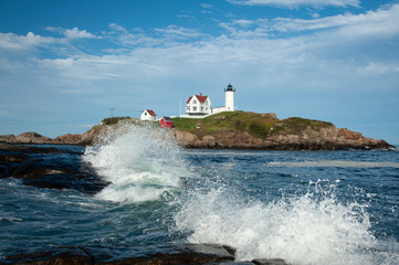 Waves Break Around Nubble Lighthouse on a Summer Day in Maine