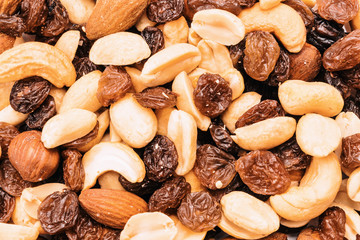 Peanuts, Cashew Nuts and Raisins Mix Background