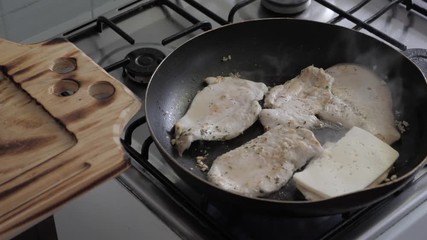 Cooking chicken with cheese at home
