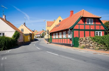 Fototapeta na wymiar Traditional colorful half timbered houses in Svaneke, Bornholm, Denmark