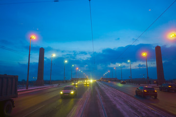 road overlooking the tram public transport way. bridge in the evening