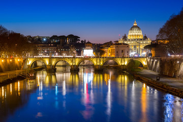 Fototapeta na wymiar Saint Peter Basilica in Vatican city with Saint Angelo Bridge in Rome, Italy