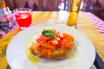 Tasty italian bruschetta on the plate