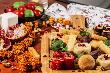 Pkhali, traditional Georgian dish of chopped and minced vegetables, made of cabbage, eggplant, spinach, beans, beets and combined with ground walnuts, vinegar, onions, garlic, pomegranate and herbs