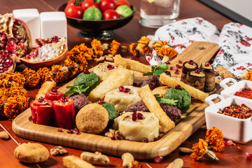 Pkhali, traditional Georgian dish of chopped and minced vegetables, made of cabbage, eggplant, spinach, beans, beets and combined with ground walnuts, vinegar, onions, garlic, pomegranate and herbs