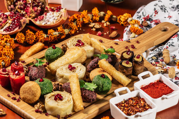 Pkhali, traditional Georgian dish of chopped and minced vegetables, made of cabbage, eggplant, spinach, beans, beets and combined with ground walnuts, vinegar, onions, garlic, pomegranate and herbs