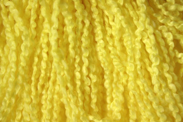 yellow color knitted wool as background