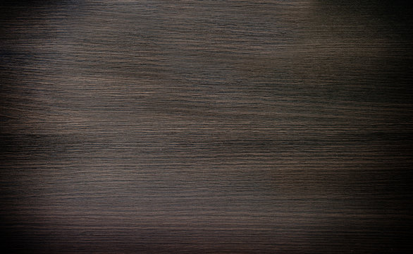 Dark brown tiles with rough textured surface imitation wood