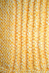 yellow color knitted wool as background