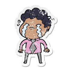 distressed sticker of a cartoon man crying