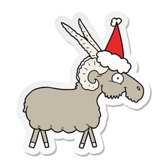 sticker cartoon of a goat wearing santa hat