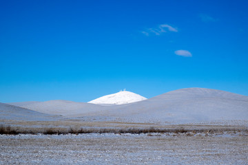 winter landscape with mountains and clouds