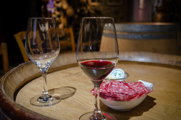 Two glasses of wine on a table