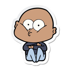 sticker of a cartoon bald man staring