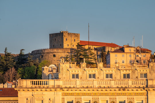 Castle Castello di San Giusto in Trieste on spring sunset