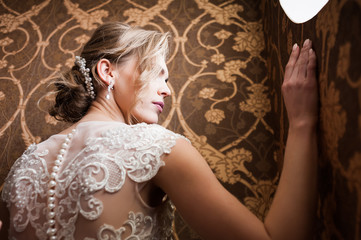 Morning of the bride when she wears a beautiful dress, woman getting ready before wedding ceremony 