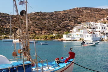 Fishing boat moored in the port of the picturesque village of Faros in Sifnos. Greece