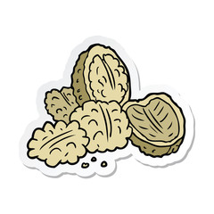 sticker of a cartoon walnuts