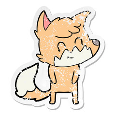 distressed sticker of a cartoon friendly fox
