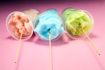 colorful cotton candy floss. sweet party food in pink and green