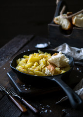 Homemade roast potatoes in cast-iron pan 