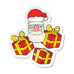 sticker of a cartoon tired santa claus face with presents