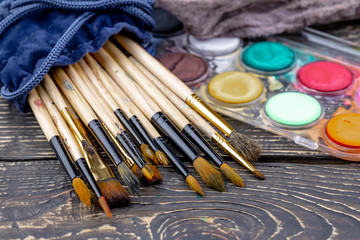 Obraz premium Paint brushes and paints for drawing.