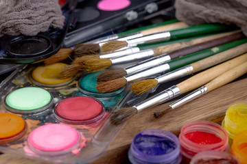 Obraz premium Paint brushes and paints for drawing.