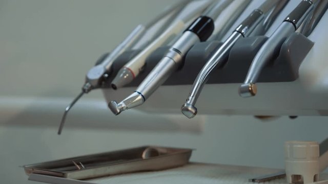 Close-up dentist equipment at camera. 4K