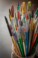 Obraz premium Paint brushes and paints for drawing.