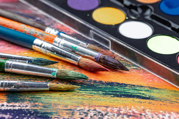 Obraz premium Paint brushes and paints for drawing.