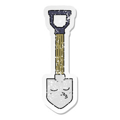 distressed sticker of a cartoon shovel