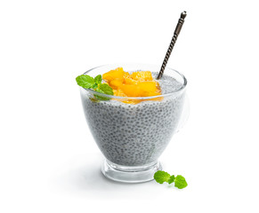 Chia seed pudding with yellow jam isolated on white