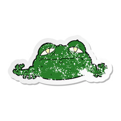 distressed sticker of a cartoon ugly frog