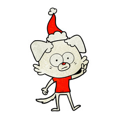 nervous dog in t shirt wearing santa hat